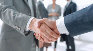 Business people shaking hands